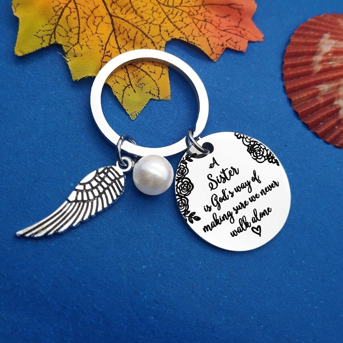 LAST DAY 49% OFF⇝💓 "A Sister is God's Way of Making Sure We Never Walk Alone" Keychain