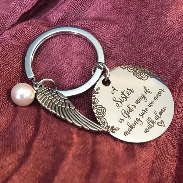 LAST DAY 49% OFF⇝💓 "A Sister is God's Way of Making Sure We Never Walk Alone" Keychain
