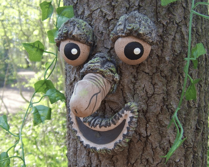 Willy the rude Tree Face - outdoor garden statues