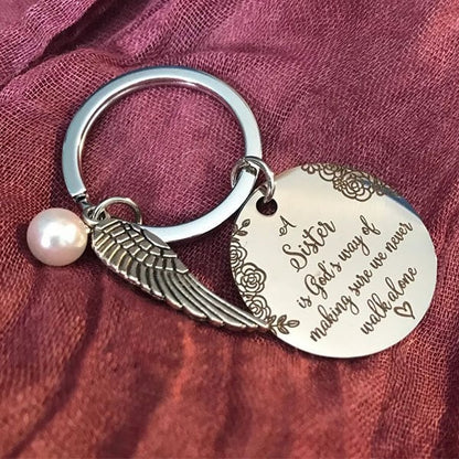 LAST DAY 49% OFF⇝💓 "A Sister is God's Way of Making Sure We Never Walk Alone" Keychain